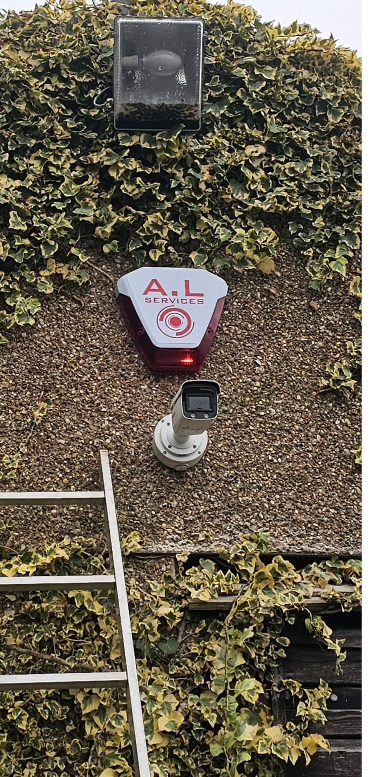 Camera and sounder covering a driveway approach