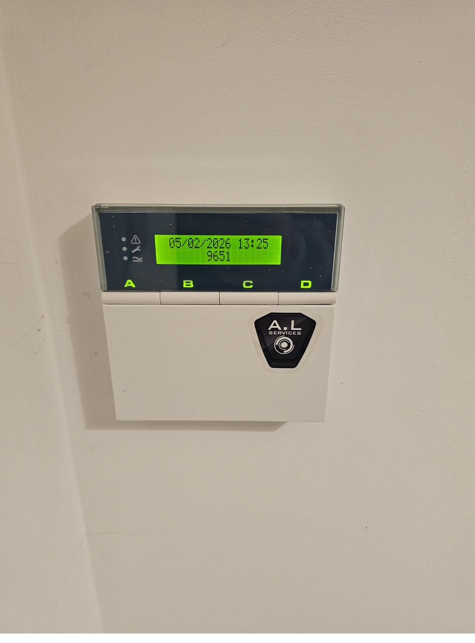 Wired alarm keypad with LCD display installed by A.L Services
